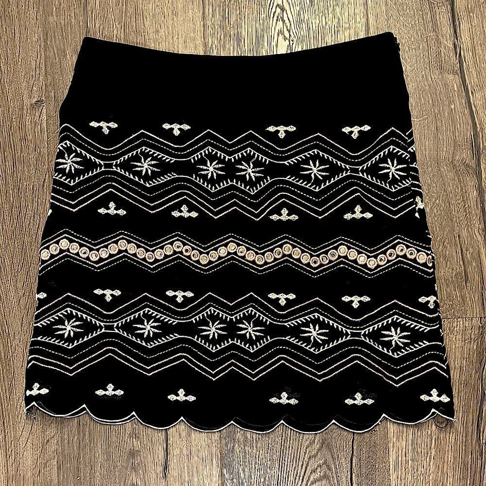 HARPER black midi skirt with pastel pattern/detailing.